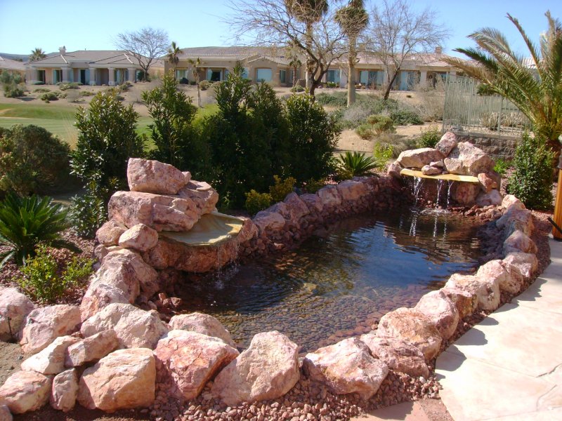 Las Vegas Landscape with water feature, flagstone, palms on golf ...