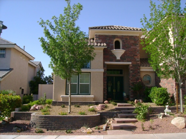 front yard of Las Vegas home with trees